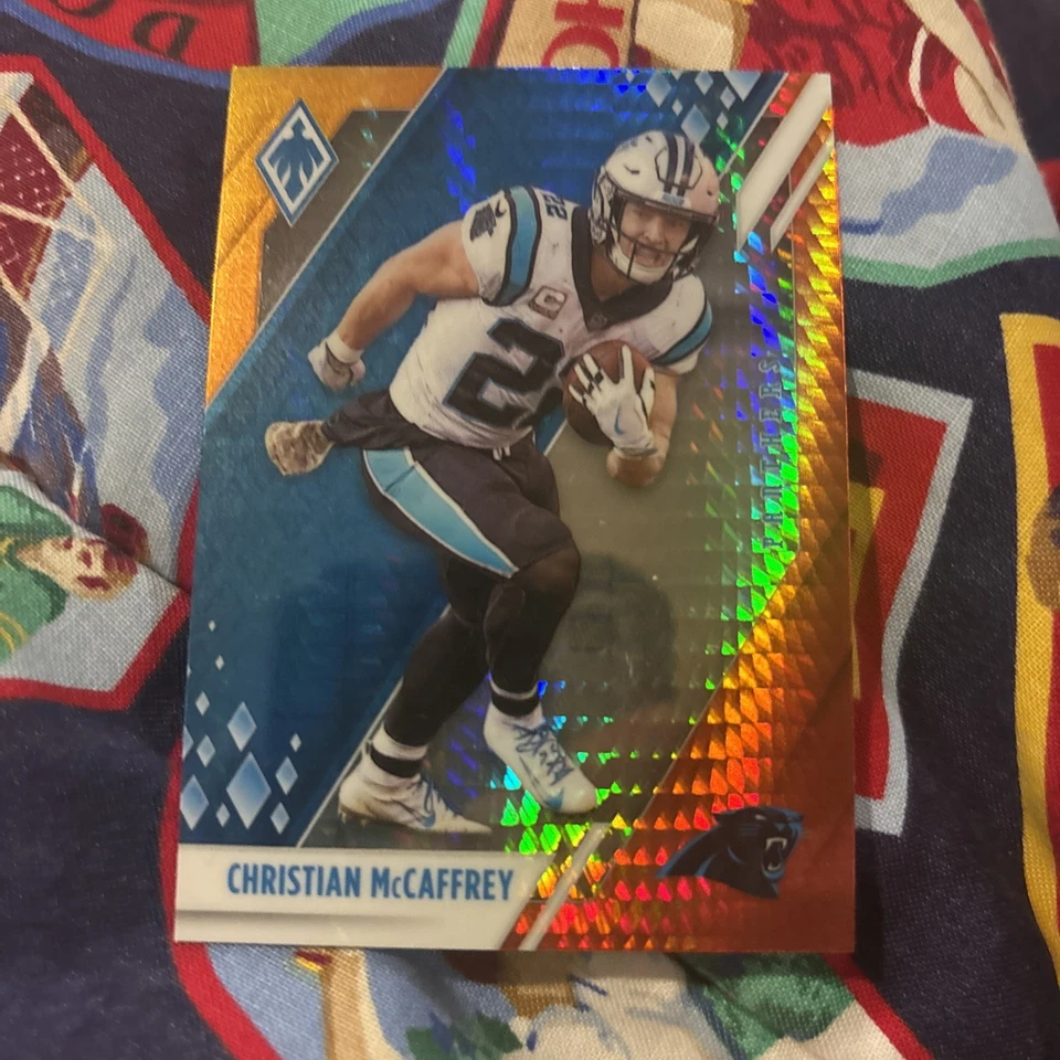 2021 Panini Phoenix - Christian McCaffrey #18 Fire Burst - Image 1 of 1