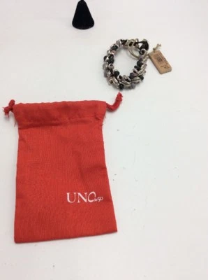 $145 FLORA Uno de 50 Pulsera U2 Foto 1 de 4