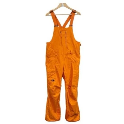 Pantalones de nieve con tirantes Freeden naranja talla grande The North Face para mujer Foto 1 de 4