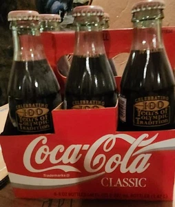 1996 Coca Cola 100 anni di tradizione olimpica da Atene ad Atlanta confezione da 6 bottiglie - Foto 1 di 1