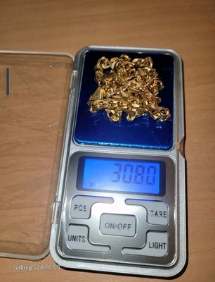 Cadena de eslabones cubanos 14k 24" Foto 1 de 4