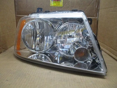 2003-2006 Lincoln Navigator Driver Side Left Headlamp OEM-6L7Z13008AB - Image 1 of 4