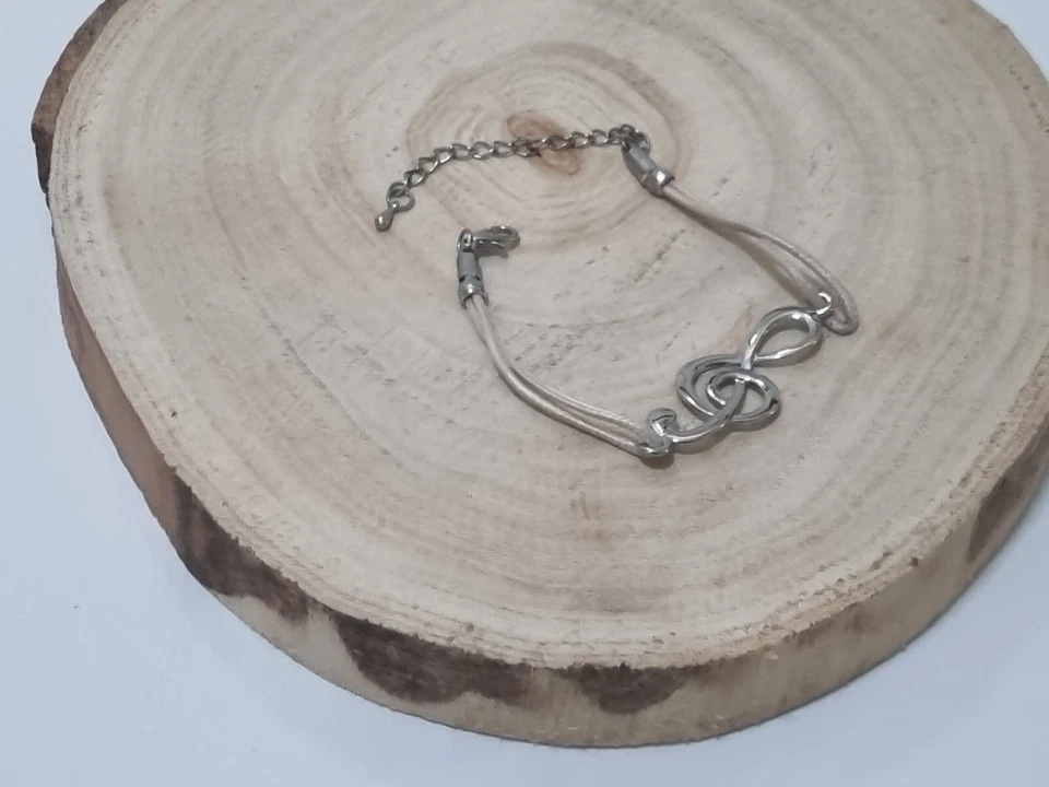 Bracciale da donna braccialetto in metallo acciaio chiave di violino usato - Immagine 1 di 4