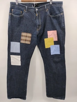 Jeans Uniqlo Ribete Kaihara Calce Regular Recto Tiro Medio Parcheado Denim 38x29 Foto 1 de 4