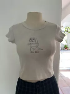 BRANDY MELVILLE Baby Cherub in Dinosaur Costume Graphic T, One Size 100% Cotton - Picture 1 of 6