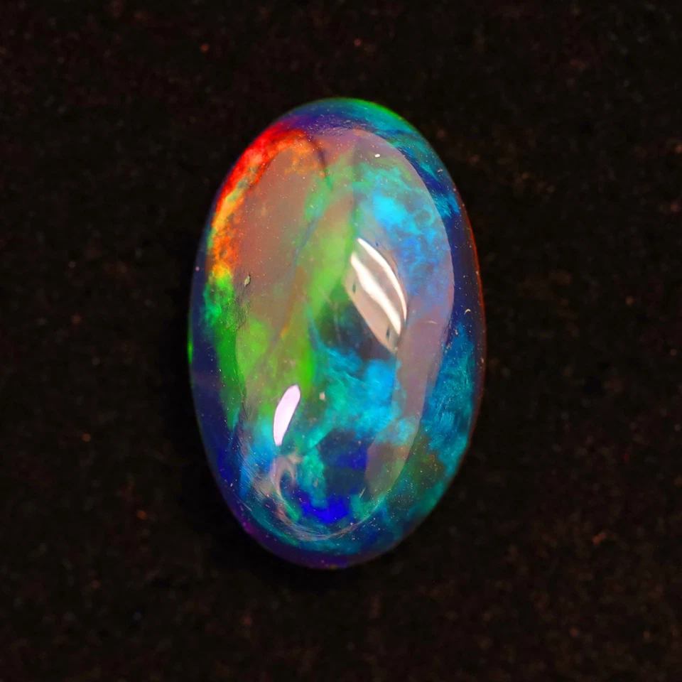 Узор из медовых гребней 2,48 карата.  Потрясающий многоцветный игровой черный опал Ethiopia Welo - Изображение 1 из 1