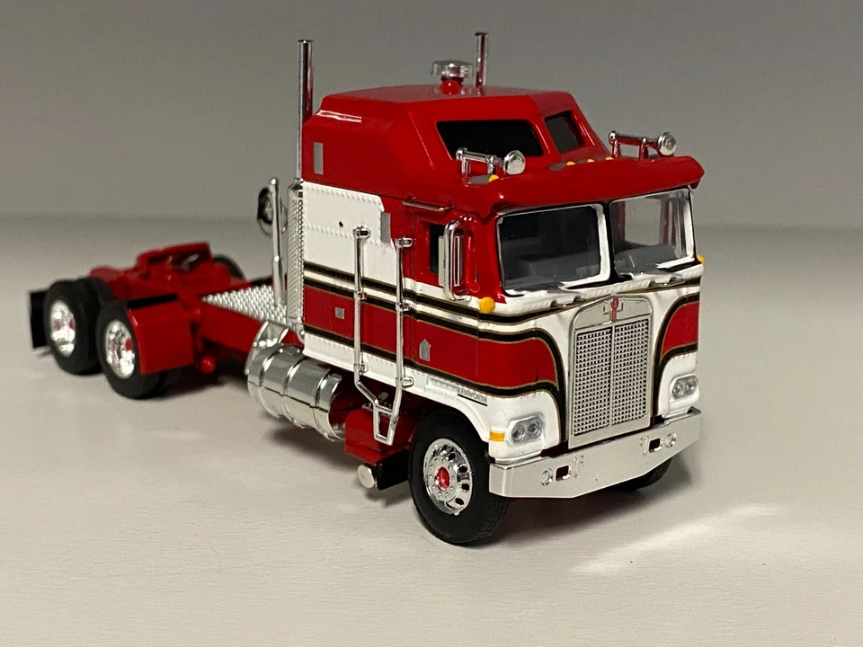 DCP 1/64 RED & WHITE KENWORTH K100 AERODYNE LONG FRAME W/CAT MOTOR - Image 1 of 2