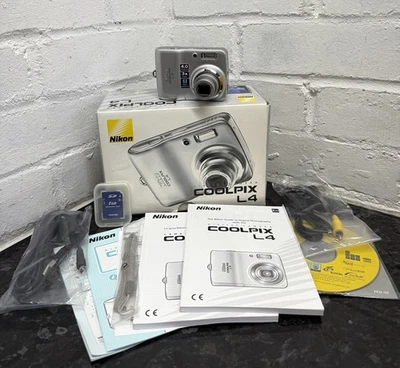 VGC Nikon Coolpix L4 Digital Camera 3x Optical Zoom Silver 1GB SD Card - Tested - Image 1 of 4