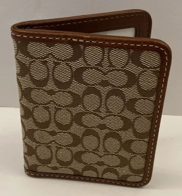 Marco de fotos de viaje vintage Coach de lona de cuero caramelo caqui doble tarjeta de identificación  Foto 1 de 3