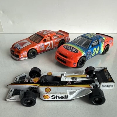 🏁 Lote de 3 coches de carreras diecast vintage 1:64 Indy y NASCAR Shell, DuPont, Citgo Foto 1 de 4
