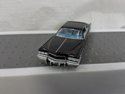Autoworld Land Yachts 1976 Cadillac cupé Deville negro fundido a presión 1:64 Foto 1 de 4
