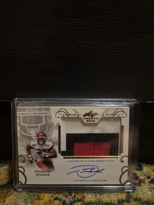 2016 Leaf Trinity - Patch Autographs Devontae Booker #PA-DB1 Gold (AU, MEM, RC) - Image 1 of 2