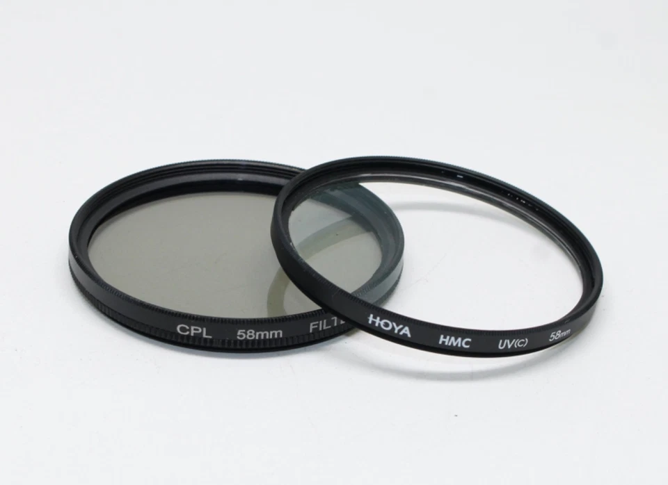 Pair of Vintage 58mm Camera Photography Lens Filters: UV (c) Circular Polarizer - Image 1 of 2