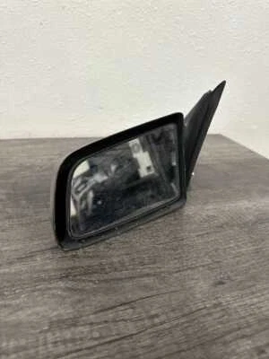Espejo retrovisor lateral manual Chevy Cavalier LH 1982-1990 OEM Foto 1 de 4
