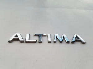 2008-2013 NISSAN ALTIMA COUPE REAR GATE LID EMBLEM BADGE SYMBOL LOGO OEM (2011) - Picture 1 of 3