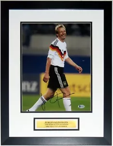 JURGEN KLINSMANN AUTOGRAFO COPPA DEL MONDO 11X14 FOTO BECKETT BAS COA PIATTO INCORNICIATO - Foto 1 di 5