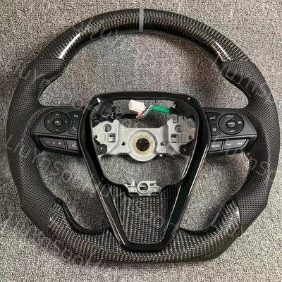 Volante de fibra de carbono real para Toyota Camry Rav4 Corolla con botón 18-23 Foto 1 de 4
