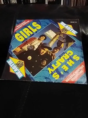 BEASTIE BOYS - GIRLS / SHE'S CRAFTY 7" IN FOLDOUT POSTER SLEEVE  - Image 1 of 3
