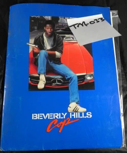Beverly Hills Cop 1984 kit de prensa original con 13 fotos - Eddie Murphy - Imagen 1 de 13