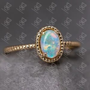 Twisted Band Oval Australian Solid Opal Ring in 14K Yellow Gold - Picture 1 of 4