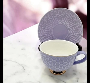 Porcelain teacup and saucer set with honeycomb pattern by Ciroa - Picture 1 of 5