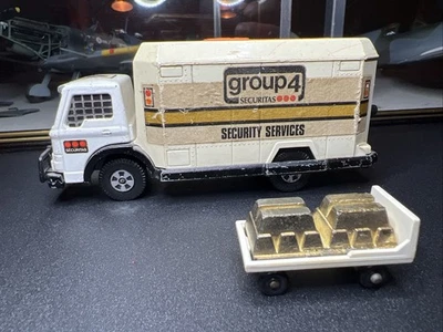 Camión de seguridad Matchbox K-19 SuperKings grupo 4 con lingotes de oro Foto 1 de 4