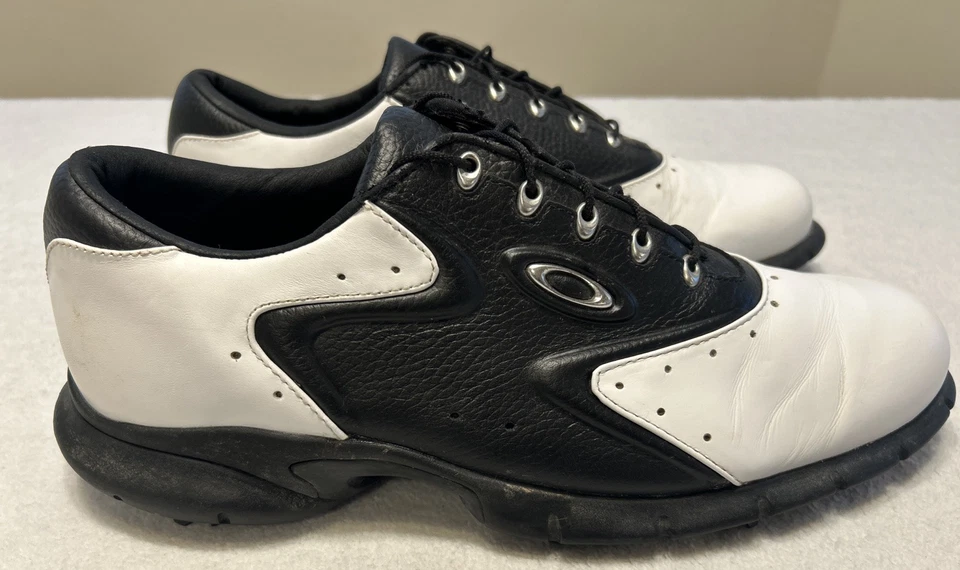 Zapatos de golf Oakley para hombre talla 13 Overdrive parte superior baja blancos negros vintage 2002 Foto 1 de 4