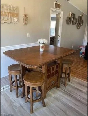 Dinning room wood high top table with wine & drawer storage & 4 bar stools  - Image 1 of 4