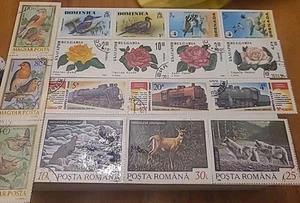 Francobolli vintage laminati di diversi paesi - Foto 1 di 9