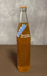 Botella de refresco de vidrio transparente Sunkist completa 16 oz en relieve una pinta 1979 primer año - Imagen 1 de 8