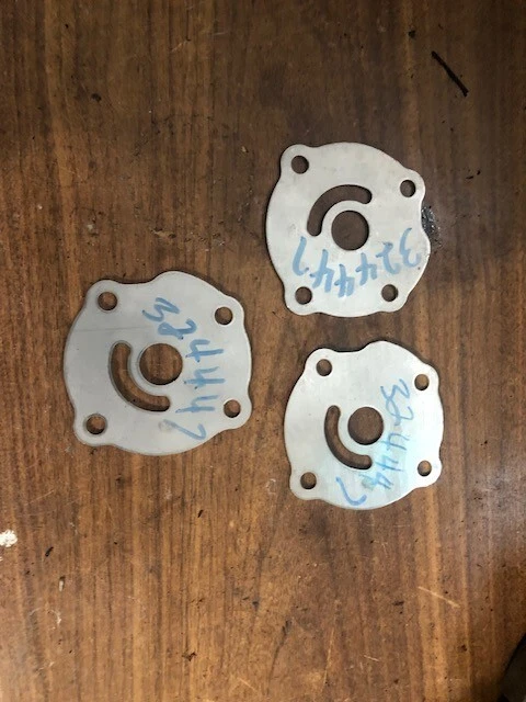 3  NOS OMC EVINRUDE JOHNSON 324447 WATER PUMP IMPELLER PLATE - Image 1 of 1