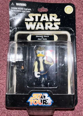 Star Wars Star Tours DONALD DUCK como Han Solo Nuevo Sellado de Fábrica Foto 1 de 4