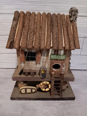 Casa de troncos vintage hecha a mano rústica pescador lago cabaña casa para pájaros decorativa Foto 1 de 4
