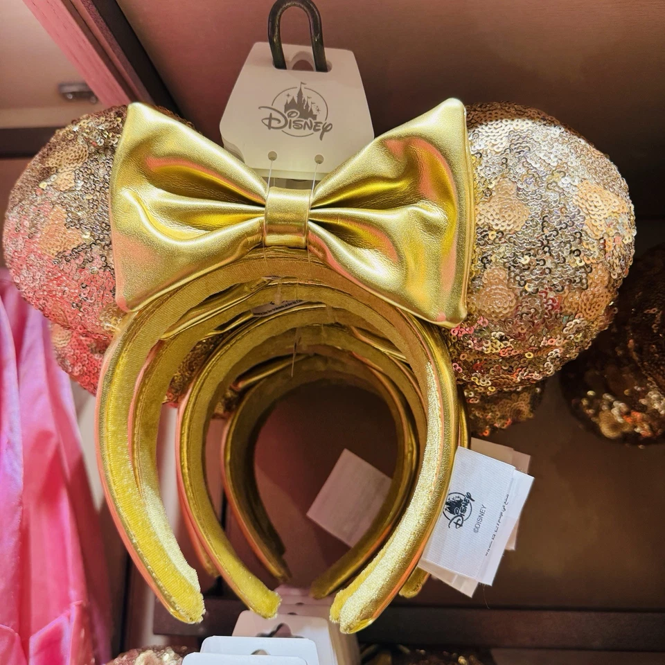 Diadema orejas doradas con lazo metálico dorado lentejuelas Minnie Mouse de los parques de Disney usada en excelente estado Foto 1 de 1