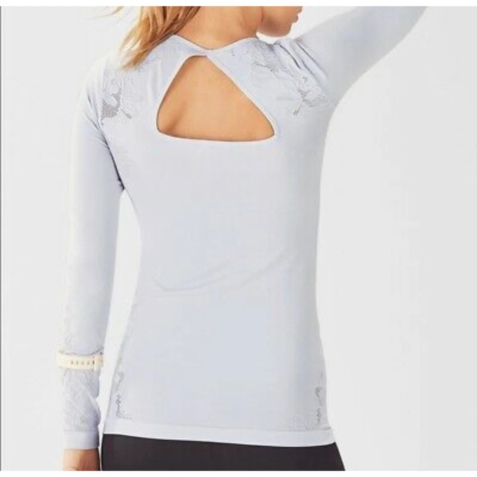 Top activo manga larga sin costuras corte lila M Fabletics Elise para mujer  Foto 1 de 4