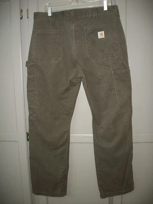 Pantalones de mezclilla Carhartt para hombre 36x30 MARRÓN pantalones de carpintero calce relajado buen estado Foto 1 de 4
