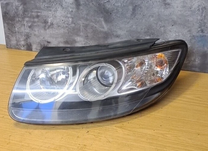 Faro lateral del pasajero Hyundai Santa Fe MK2 2011 92101-2B0 Foto 1 de 4