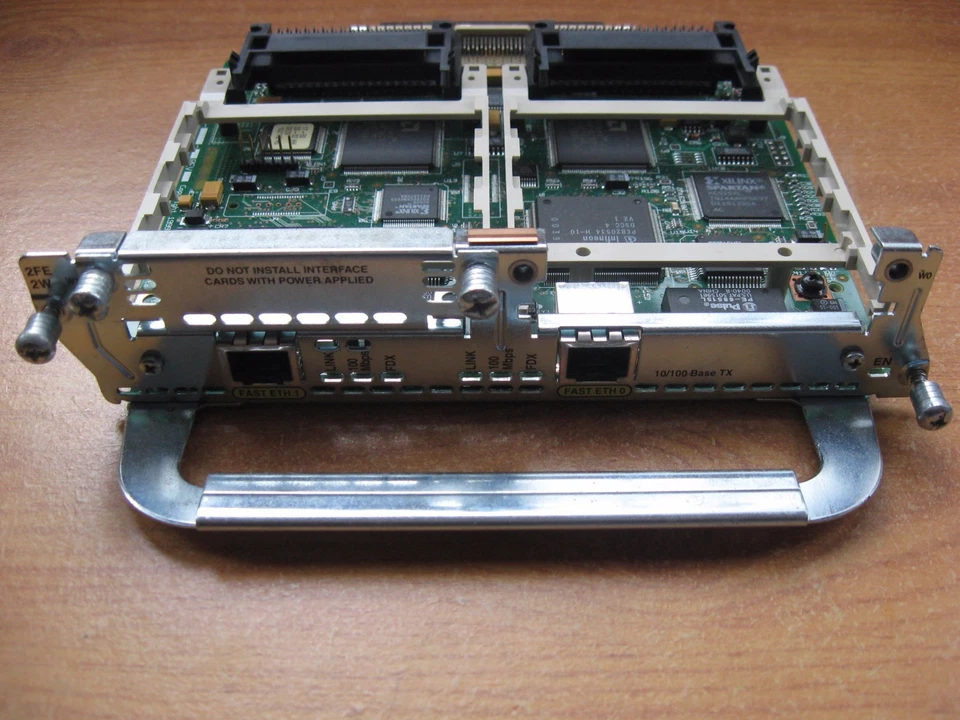 Cisco NM-2FE2W 2-Port Fast Ethernet & 2-Port WIC Network Module - Image 1 of 1