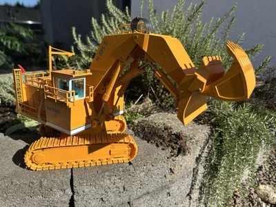 Demag H 485 S NZG 357 Hochlöffelbagger wie neu im Originalkarton - Bild 1 von 4