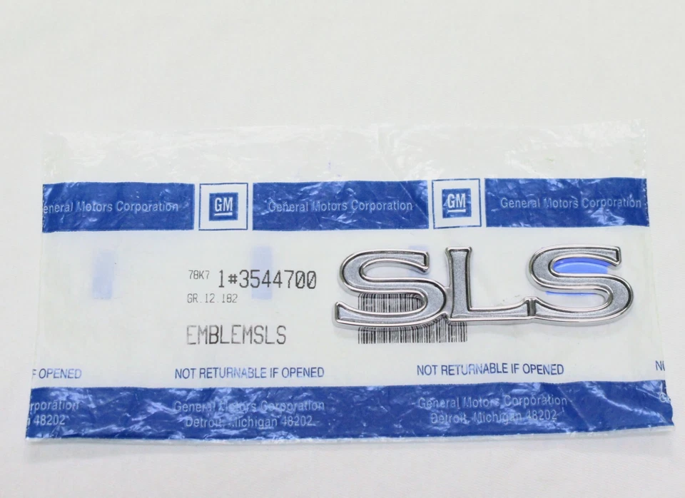 1994 - 1997 CADILLAC SEVILLE "SLS" REAR DECK EMBLEM NAME CHROME- NEW 3544700 - Image 1 of 1