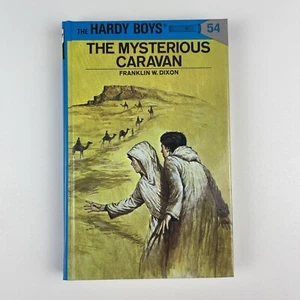 The Hardy Boys Vol 54 The Mysterious Caravan (Franklin W. Dixon 1975 Hardcover) - Foto 1 di 6