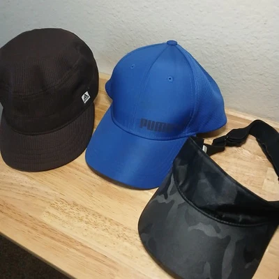 Lote de 3 sombreros usados - Puma negro, Adidas azul y uno negro camuflaje | Excelente estado Foto 1 de 4