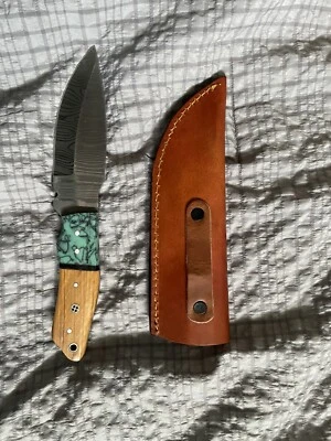 Cuchillo de campamento 4,5# hoja plateada mango de plástico con estuche incluido Foto 1 de 4