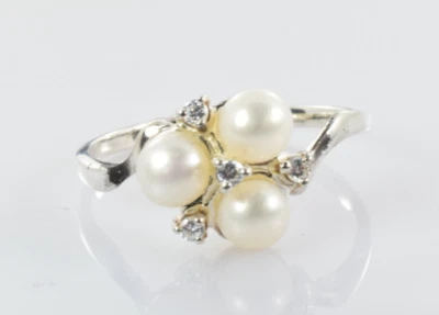 Anillo de tres perlas con detalles de piedra blanca en plata de ley talla 10 Foto 1 de 4