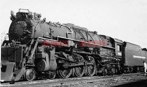 3E815 RP 1956 CHESAPEAKE & OHIO RR 464 LOCO 314 GOLPEADO JUNTO A DEPÓSITO DE CHATARRA PROVISIONAL - Imagen 1 de 2