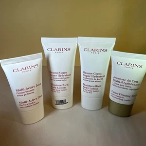2 Clarins Moisture Rich Body Lotion With Shea Butter Mini 0.9 Oz. each, W/ Bonus - Picture 1 of 2