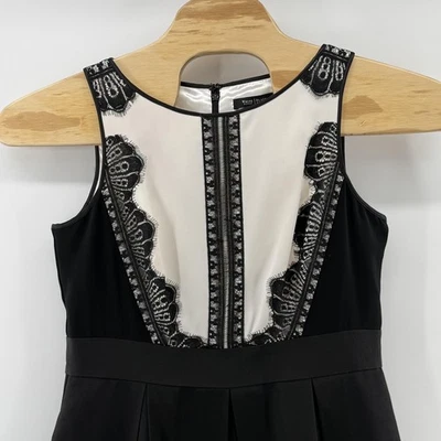 Elegante Vestido Casa Blanca Mercado Negro 12 Negro Crema Encaje Ajuste Acampanado Bolsillos Foto 1 de 4