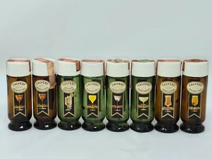 LOTE DE 8 MINI BOTELLAS DE LICOR VINTAGE CALVERT 2 OZ ÁMBAR Y VIDRIO VERDE VACÍAS - Imagen 1 de 7