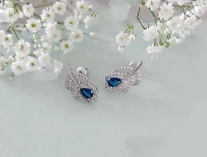 Teardrop sapphire set in white gold plated feather motif pierced stud earrings - Picture 1 of 9