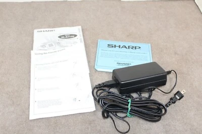 Sharp AC Adapter 15W AL-A111U  Charger and Manual - Image 1 of 4